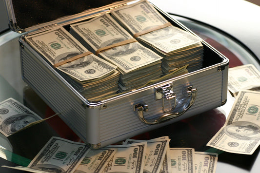 stack of money in a briefcase